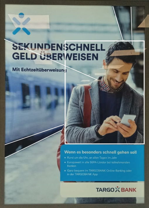 Werbeplakat mit Planimetrielinien von Targo-Bank mit dem Titel "Sekundenschnell Geld überweisen mit Echtzeitüberweisung"